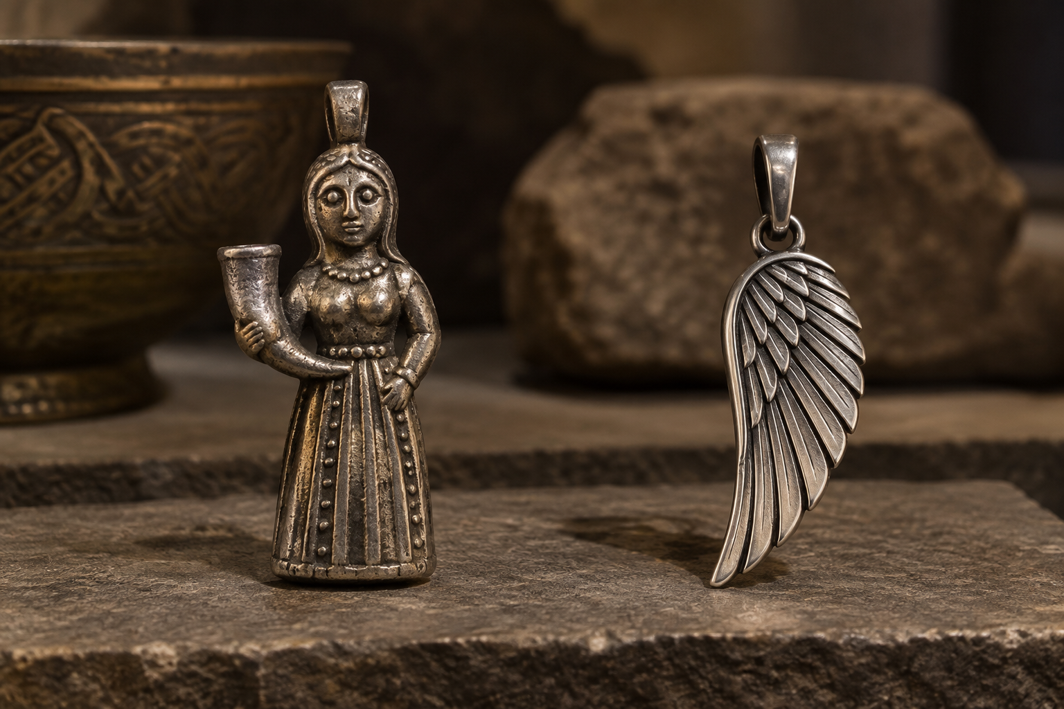 Viking Age style female figure and modern wing-shaped silver pendants